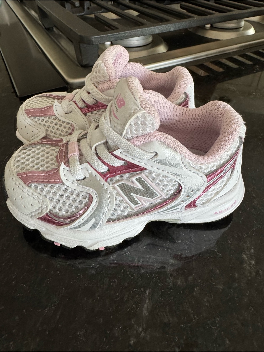 New Balance 530 White and Pink Kids' Athletic Sneakers
